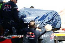The Scuderia Toro Rosso STR10 of Carlos Sainz Jr (ESP) Scuderia Toro Rosso is recovered back to the pits on the back of a truck. 22.02.2015. Formula One Testing, Day Four, Barcelona, Spain.