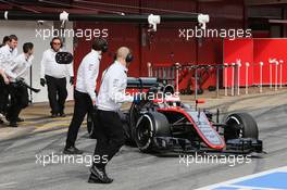 Jenson Button (GBR) McLaren MP4-30 in the pits. 27.02.2015. Formula One Testing, Day Two, Barcelona, Spain.