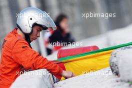 A marshal. 27.02.2015. Formula One Testing, Day Two, Barcelona, Spain.