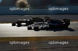 Romain Grosjean (FRA) Lotus F1 E23 leads Nico Hulkenberg (GER) Sahara Force India F1 VJM08. 28.02.2015. Formula One Testing, Day Three, Barcelona, Spain.