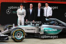 Qualcomm are announed as official technology partner for the Mercedes AMG F1 team (L to R): Toto Wolff (GER) Mercedes AMG F1 Shareholder and Executive Director; Derek Aberle, Qualcomm Incorporated President; ; Toto Wolff (GER) Mercedes AMG F1 Shareholder and Executive Director. 01.03.2015. Formula One Testing, Day Four, Barcelona, Spain.