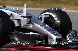 Nico Rosberg (GER) Mercedes AMG F1 W06 running flow-vis paint on the camera mounts. 01.03.2015. Formula One Testing, Day Four, Barcelona, Spain.