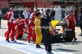 The Ferrari SF15-T of Sebastian Vettel (GER) Ferrari is pushed down the pit lane. 01.03.2015. Formula One Testing, Day Four, Barcelona, Spain.