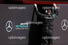 Mercedes AMG F1 mechanic with screens up outisde the pit garage. 13.05.2015. Formula 1 Testing, Day Two, Barcelona, Spain, Wednesday.