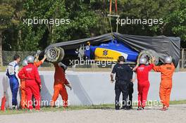 The Sauber C34 of Raffaele Marciello (ITA) Sauber C34 Test And Reserve Driver is recovered back to the pits. 13.05.2015. Formula 1 Testing, Day Two, Barcelona, Spain, Wednesday.