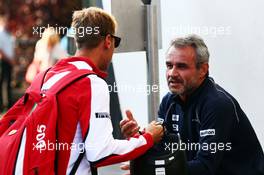 (L to R): Sebastian Vettel (GER) Ferrari with Beat Zehnder (SUI) Sauber F1 Team Manager. 21.08.2015. Formula 1 World Championship, Rd 11, Belgian Grand Prix, Spa Francorchamps, Belgium, Practice Day.