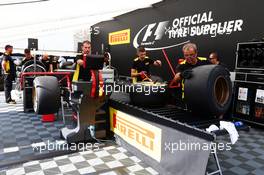 Pirelli tyre technicians. 21.08.2015. Formula 1 World Championship, Rd 11, Belgian Grand Prix, Spa Francorchamps, Belgium, Practice Day.