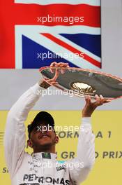 Race winner Lewis Hamilton (GBR) Mercedes AMG F1 celebrates on the podium. 23.08.2015. Formula 1 World Championship, Rd 13, Belgian Grand Prix, Spa Francorchamps, Belgium, Race Day.