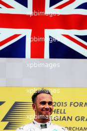 Race winner Lewis Hamilton (GBR) Mercedes AMG F1 celebrates on the podium. 23.08.2015. Formula 1 World Championship, Rd 13, Belgian Grand Prix, Spa Francorchamps, Belgium, Race Day.