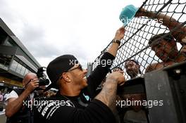 Lewis Hamilton (GBR) Mercedes AMG F1 signs autographs for the fans. 23.08.2015. Formula 1 World Championship, Rd 13, Belgian Grand Prix, Spa Francorchamps, Belgium, Race Day.