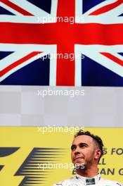 Race winner Lewis Hamilton (GBR) Mercedes AMG F1 celebrates on the podium. 23.08.2015. Formula 1 World Championship, Rd 13, Belgian Grand Prix, Spa Francorchamps, Belgium, Race Day.