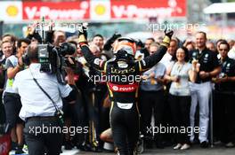 Romain Grosjean (FRA) Lotus F1 Team celebrates his third position with the team at parc ferme. 23.08.2015. Formula 1 World Championship, Rd 13, Belgian Grand Prix, Spa Francorchamps, Belgium, Race Day.