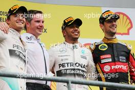 The podium (L to R): Nico Rosberg (GER) Mercedes AMG F1; Lewis Hamilton (GBR) Mercedes AMG F1, race winner; Romain Grosjean (FRA) Lotus F1 Team, third. 23.08.2015. Formula 1 World Championship, Rd 13, Belgian Grand Prix, Spa Francorchamps, Belgium, Race Day.