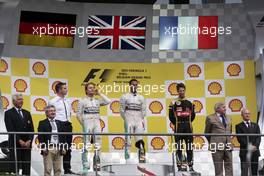 The podium (L to R): Nico Rosberg (GER) Mercedes AMG F1, second; Lewis Hamilton (GBR) Mercedes AMG F1, race winner; Romain Grosjean (FRA) Lotus F1 Team, third. 23.08.2015. Formula 1 World Championship, Rd 13, Belgian Grand Prix, Spa Francorchamps, Belgium, Race Day.