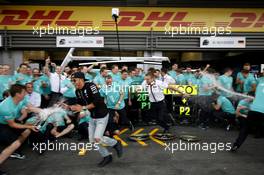 Race winner Lewis Hamilton (GBR) Mercedes AMG F1 celebrates with the team. 23.08.2015. Formula 1 World Championship, Rd 13, Belgian Grand Prix, Spa Francorchamps, Belgium, Race Day.