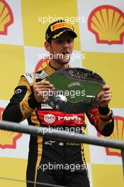 Romain Grosjean (FRA) Lotus F1 Team celebrates his third position on the podium. 23.08.2015. Formula 1 World Championship, Rd 13, Belgian Grand Prix, Spa Francorchamps, Belgium, Race Day.