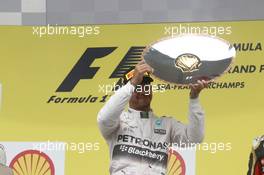 Race winner Lewis Hamilton (GBR) Mercedes AMG F1 celebrates on the podium. 23.08.2015. Formula 1 World Championship, Rd 13, Belgian Grand Prix, Spa Francorchamps, Belgium, Race Day.