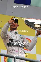 Race winner Lewis Hamilton (GBR) Mercedes AMG F1 celebrates on the podium. 23.08.2015. Formula 1 World Championship, Rd 13, Belgian Grand Prix, Spa Francorchamps, Belgium, Race Day.