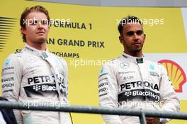 (L to R): Nico Rosberg (GER) Mercedes AMG F1 with race winner Lewis Hamilton (GBR) Mercedes AMG F1 on the podium. 23.08.2015. Formula 1 World Championship, Rd 13, Belgian Grand Prix, Spa Francorchamps, Belgium, Race Day.