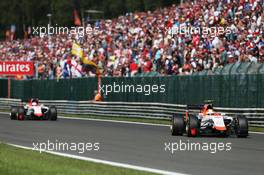 Roberto Merhi (ESP) Manor Marussia F1 Team leads team mate Will Stevens (GBR) Manor Marussia F1 Team. 23.08.2015. Formula 1 World Championship, Rd 13, Belgian Grand Prix, Spa Francorchamps, Belgium, Race Day.