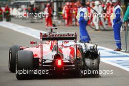 Sebastian Vettel (GER) Ferrari SF15-T heads to the pit late in the race with a puncture. 23.08.2015. Formula 1 World Championship, Rd 13, Belgian Grand Prix, Spa Francorchamps, Belgium, Race Day.