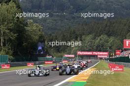 Lewis Hamilton (GBR) Mercedes AMG F1 W06 and Sergio Perez (MEX) Sahara Force India F1 VJM08 battle for the lead at the start of the race. 23.08.2015. Formula 1 World Championship, Rd 13, Belgian Grand Prix, Spa Francorchamps, Belgium, Race Day.