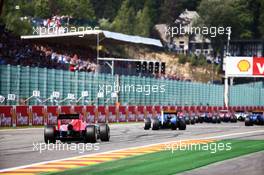 Will Stevens (GBR) Manor Marussia F1 Team heads to the grid. 23.08.2015. Formula 1 World Championship, Rd 13, Belgian Grand Prix, Spa Francorchamps, Belgium, Race Day.