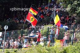 Fans with flags for Sebastian Vettel (GER) Ferrari.