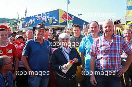Bernie Ecclestone (GBR) meets Belgian farmers who protest with a cow in a campagin for a fair price for their milk.