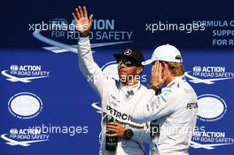 (L to R): Lewis Hamilton (GBR) Mercedes AMG F1 celebrates his pole position in parc ferme with second placed team mate Nico Rosberg (GER) Mercedes AMG F1. 22.08.2015. Formula 1 World Championship, Rd 11, Belgian Grand Prix, Spa Francorchamps, Belgium, Qualifying Day.