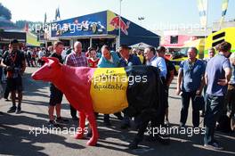 Belgian farmers protest with a cow for a fair price for their milk.