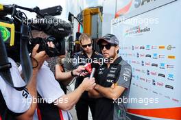 Sergio Perez (MEX) Sahara Force India F1 with the media. 20.08.2015. Formula 1 World Championship, Rd 11, Belgian Grand Prix, Spa Francorchamps, Belgium, Preparation Day.