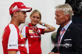 (L to R): Sebastian Vettel (GER) Ferrari with Mark Surer (SUI). 20.08.2015. Formula 1 World Championship, Rd 11, Belgian Grand Prix, Spa Francorchamps, Belgium, Preparation Day.