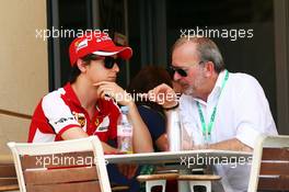 (L to R): Esteban Gutierrez (MEX) Ferrari Test and Reserve Driver with Didier Coton (BEL) Driver Manager. 17.04.2015. Formula 1 World Championship, Rd 4, Bahrain Grand Prix, Sakhir, Bahrain, Practice Day