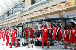 Ferrari mechanics perform some warm up exercises. 17.04.2015. Formula 1 World Championship, Rd 4, Bahrain Grand Prix, Sakhir, Bahrain, Practice Day
