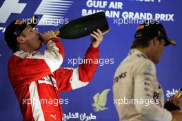 Kimi Raikkonen (FIN) Ferrari celebrates his second position on the podium. 19.04.2015. Formula 1 World Championship, Rd 4, Bahrain Grand Prix, Sakhir, Bahrain, Race Day.