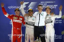 1st place for Lewis Hamilton (GBR) Mercedes AMG F1 W06, 2nd for Kimi Raikkonen (FIN) Ferrari SF15-T and 3rd place for Nico Rosberg (GER) Mercedes AMG F1. 19.04.2015. Formula 1 World Championship, Rd 4, Bahrain Grand Prix, Sakhir, Bahrain, Race Day.