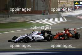 Valtteri Bottas (FIN), Williams F1 Team and Sebastian Vettel (GER), Scuderia Ferrari  19.04.2015. Formula 1 World Championship, Rd 4, Bahrain Grand Prix, Sakhir, Bahrain, Race Day.