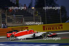 Will Stevens (GBR) Manor Marussia F1 Team and team mate Roberto Merhi (ESP) Manor Marussia F1 Team battle for position. 19.04.2015. Formula 1 World Championship, Rd 4, Bahrain Grand Prix, Sakhir, Bahrain, Race Day.