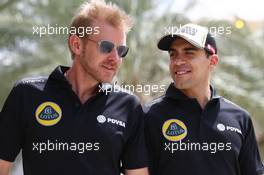 Pastor Maldonado (VEN) Lotus F1 Team with Andy Stobart (GBR) Lotus F1 Team Press Officer (Left). 18.04.2015. Formula 1 World Championship, Rd 4, Bahrain Grand Prix, Sakhir, Bahrain, Qualifying Day.