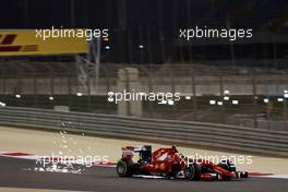 Kimi Raikkonen (FIN) Ferrari SF15-T sends sparks flying. 18.04.2015. Formula 1 World Championship, Rd 4, Bahrain Grand Prix, Sakhir, Bahrain, Qualifying Day.