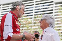 (L to R): Maurizio Arrivabene (ITA) Ferrari Team Principal with Bernie Ecclestone (GBR). 19.04.2015. Formula 1 World Championship, Rd 4, Bahrain Grand Prix, Sakhir, Bahrain, Race Day.