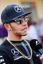 Lewis Hamilton (GBR) Mercedes AMG F1 with the media. 16.04.2015. Formula 1 World Championship, Rd 4, Bahrain Grand Prix, Sakhir, Bahrain, Preparation Day.