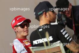 Sebastian Vettel (GER), Scuderia Ferrari and Lewis Hamilton (GBR), Mercedes AMG F1 Team  16.04.2015. Formula 1 World Championship, Rd 4, Bahrain Grand Prix, Sakhir, Bahrain, Preparation Day.