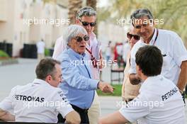 (L to R): Paddy Lowe (GBR) Mercedes AMG F1 Executive Director (Technical) with Bernie Ecclestone (GBR) and Toto Wolff (GER) Mercedes AMG F1 Shareholder and Executive Director. 16.04.2015. Formula 1 World Championship, Rd 4, Bahrain Grand Prix, Sakhir, Bahrain, Preparation Day.