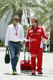 (L to R): Maurizio Arrivabene (ITA) Ferrari Team Principal with Gino Rosato (CDN) Ferrari. 16.04.2015. Formula 1 World Championship, Rd 4, Bahrain Grand Prix, Sakhir, Bahrain, Preparation Day.