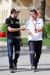 (L to R): Pastor Maldonado (VEN) Lotus F1 Team with Davide Valsecchi (ITA). 16.04.2015. Formula 1 World Championship, Rd 4, Bahrain Grand Prix, Sakhir, Bahrain, Preparation Day.