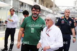 Bernie Ecclestone (GBR) with Luis Garcia Abad (ESP) Driver Manager. 13.11.2015. Formula 1 World Championship, Rd 18, Brazilian Grand Prix, Sao Paulo, Brazil, Practice Day.