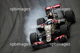 Romain Grosjean (FRA) Lotus F1 E23 locks up under braking. 13.11.2015. Formula 1 World Championship, Rd 18, Brazilian Grand Prix, Sao Paulo, Brazil, Practice Day.