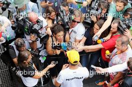 Lewis Hamilton (GBR) Mercedes AMG F1 with the media. 13.11.2015. Formula 1 World Championship, Rd 18, Brazilian Grand Prix, Sao Paulo, Brazil, Practice Day.